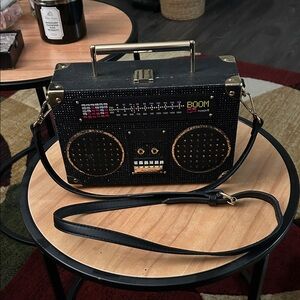 Black boombox radio crossbody purse.
